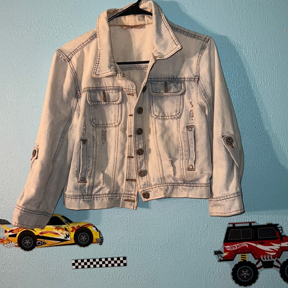 Distressed jean jacket light blue
